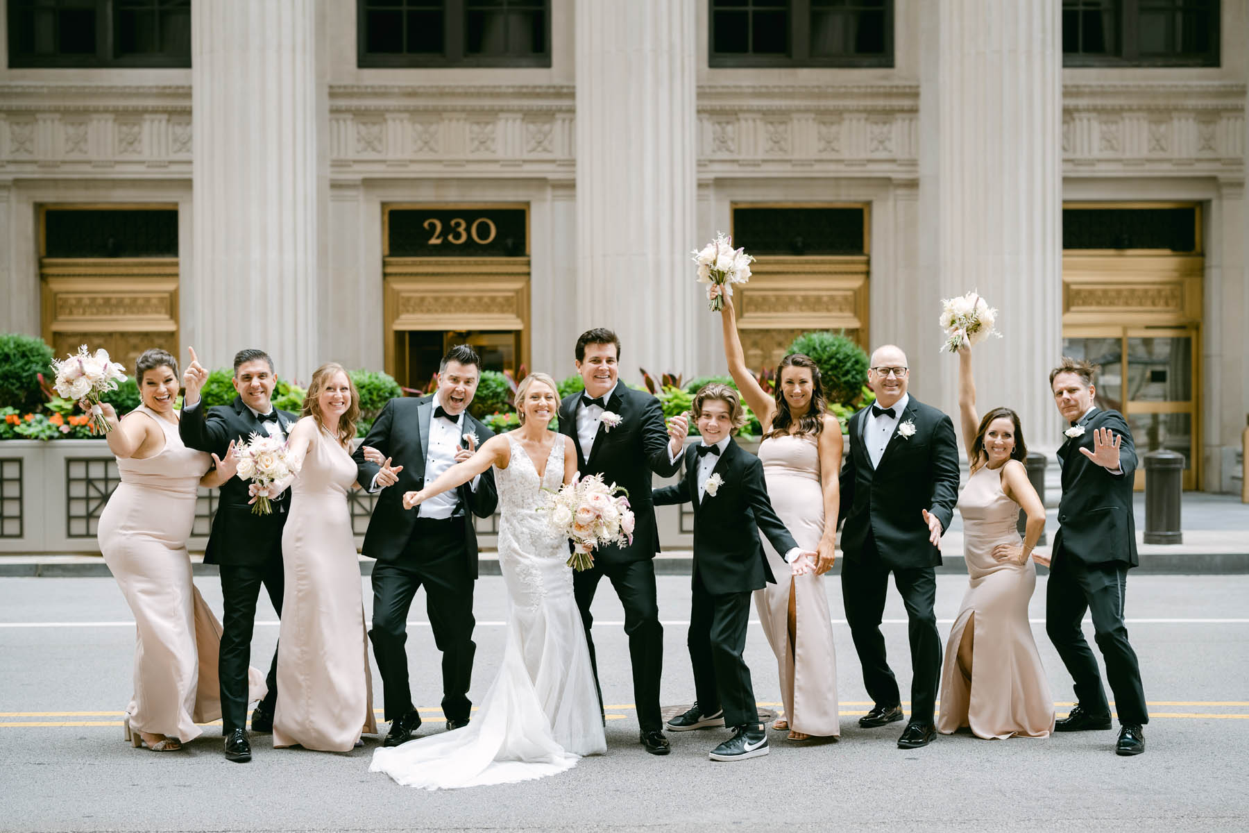 Bridal party posing for photos at the Chicago Board of Trade wedding