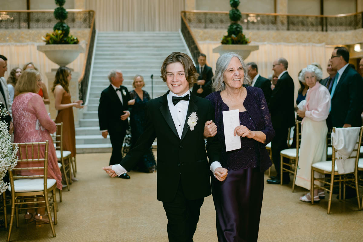 Grandmother walking down the aisle