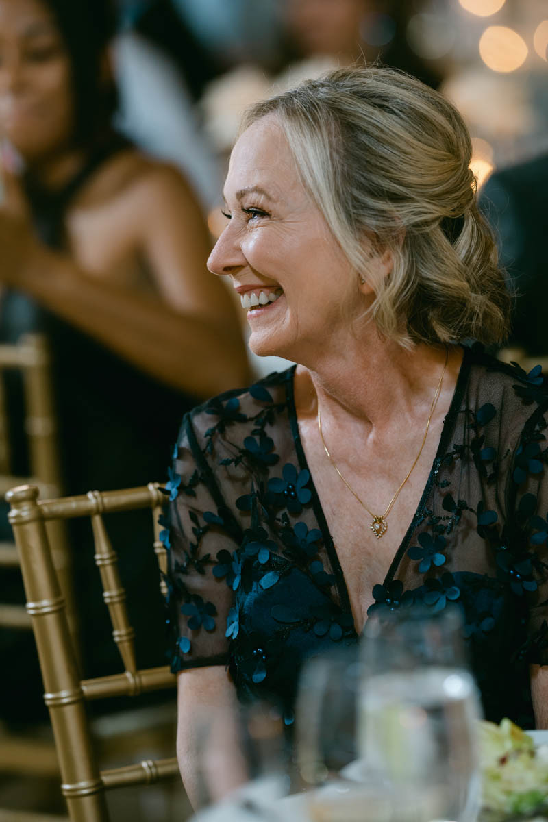 Mom laughing at wedding toast