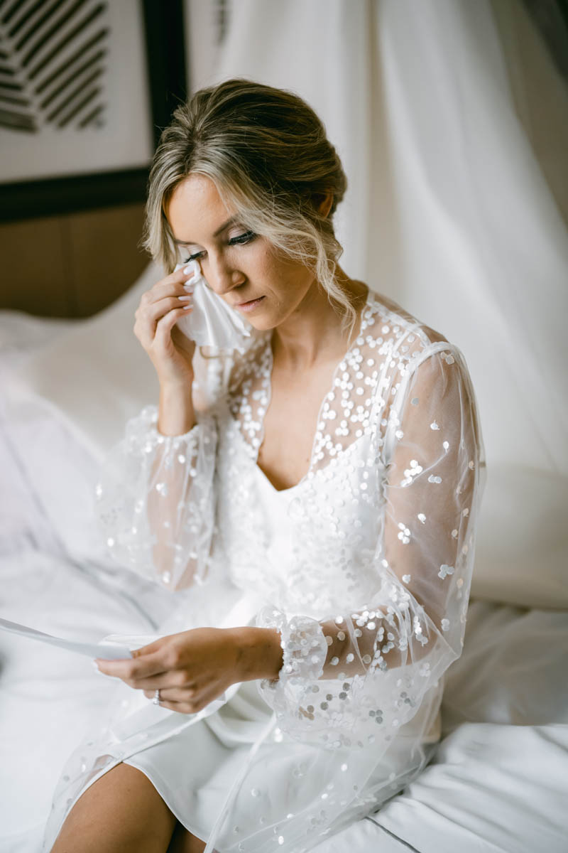 Bride reading letter from groom