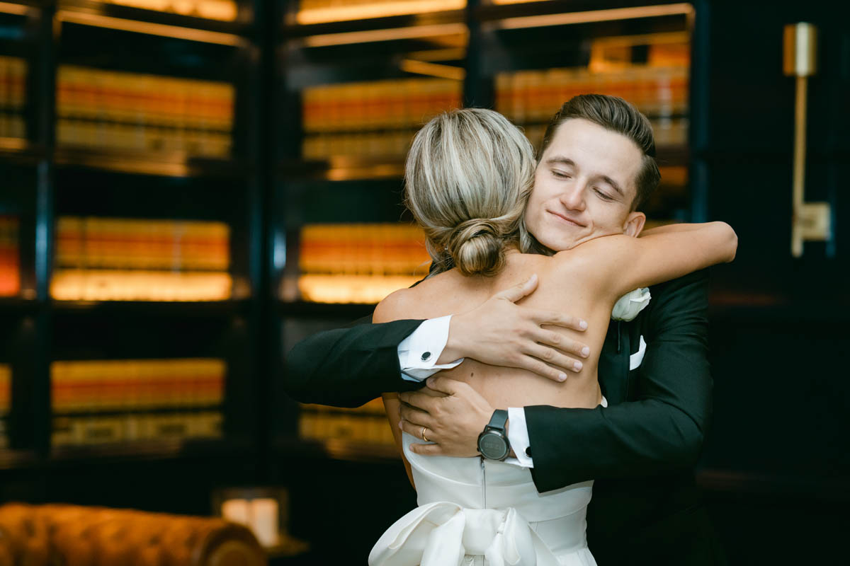 bride hugging her brother