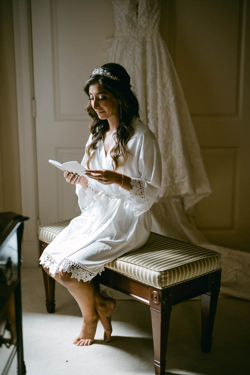Bride reading letter at Union League Club wedding