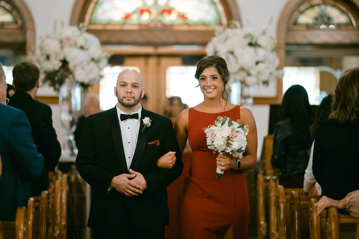 bridesmaid walking down the aisle