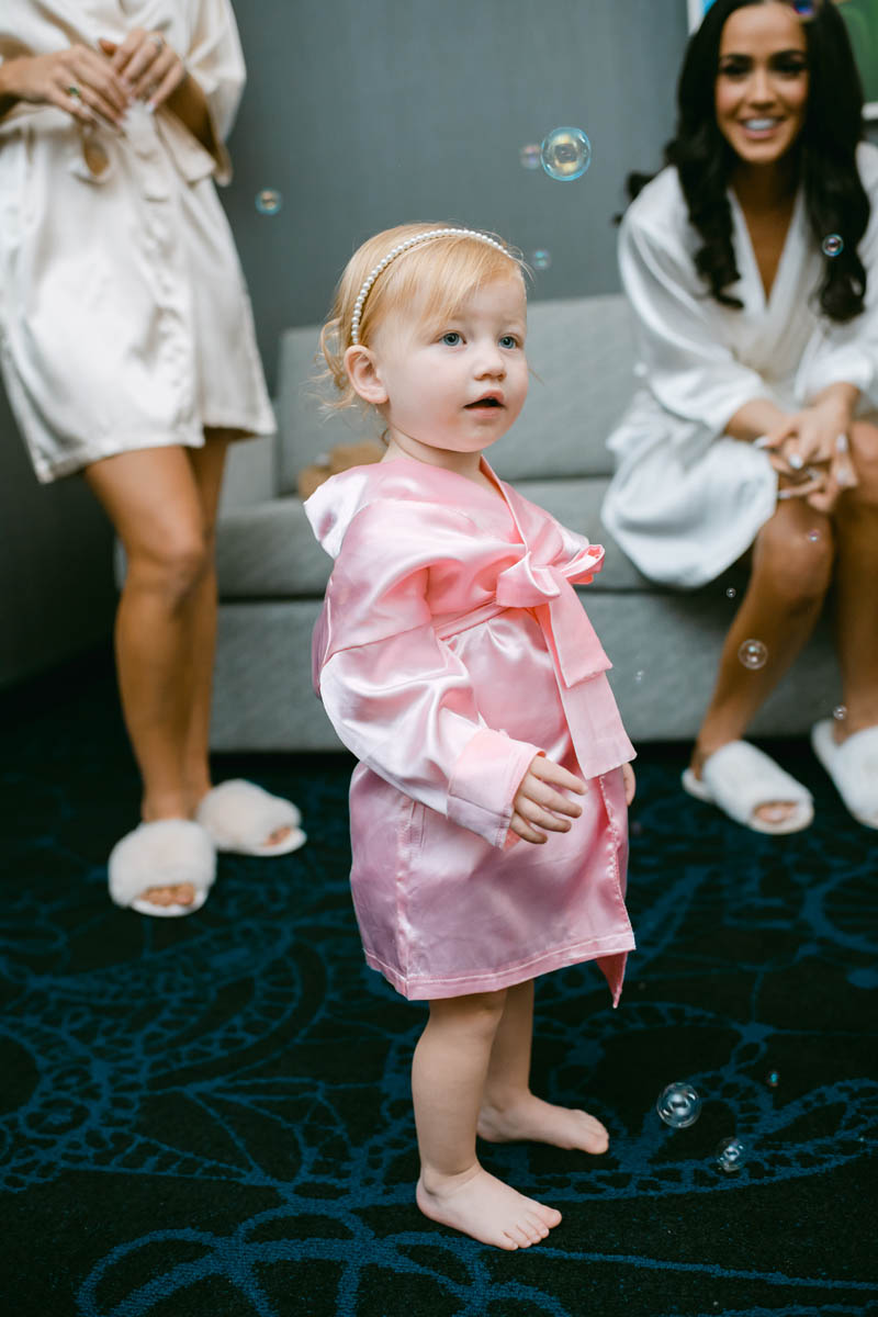 cute flower girl with bubbles