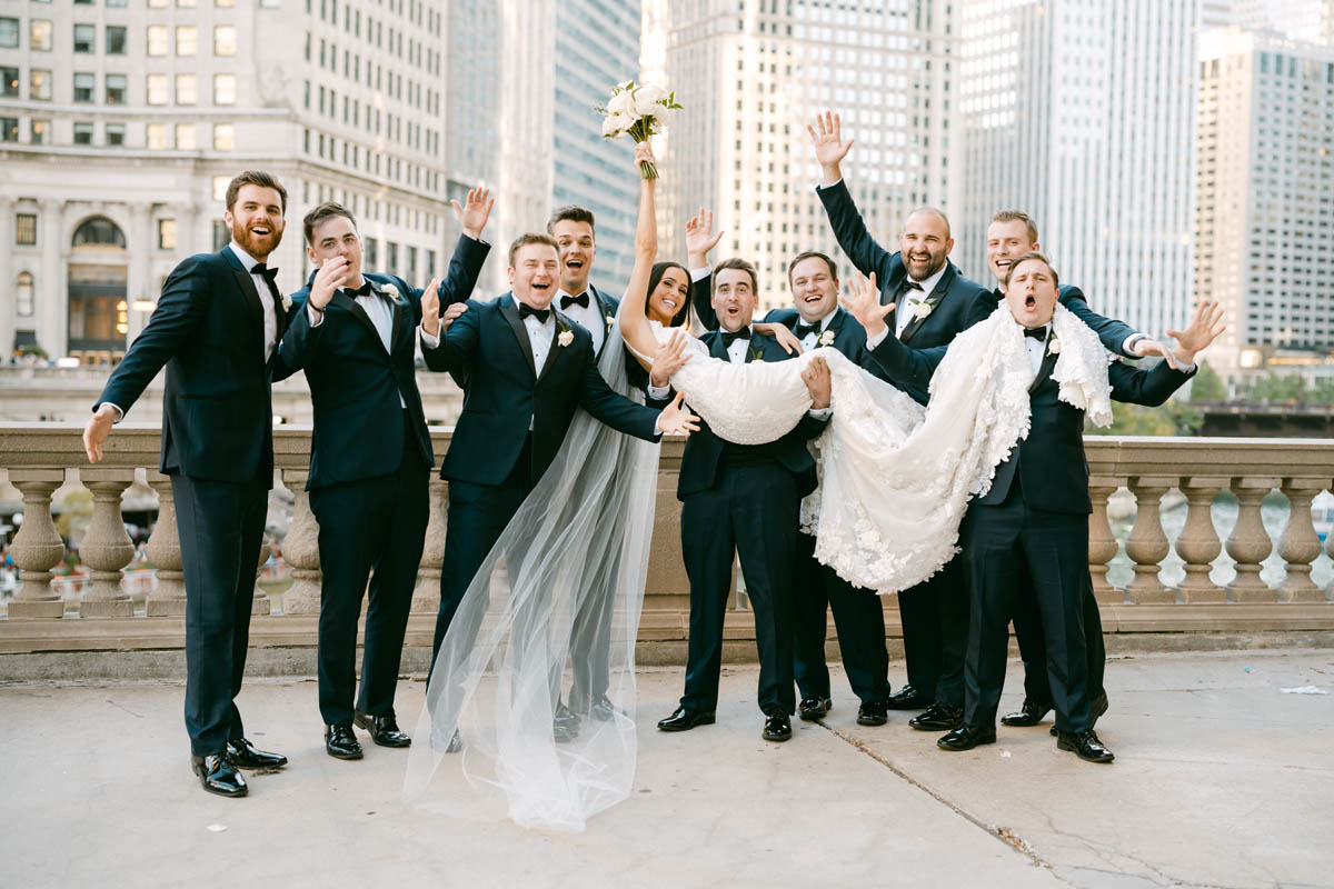 Groomsmen at fall Wrigley Building wedding