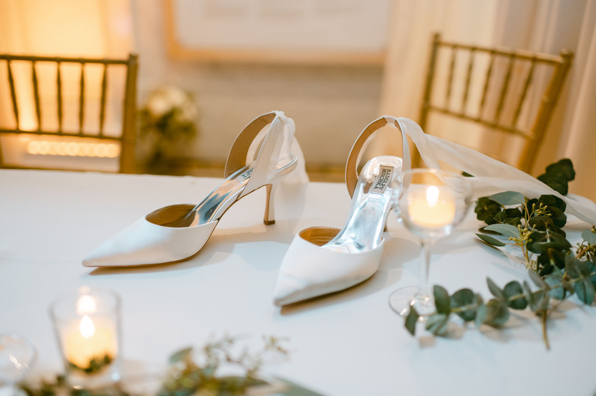 wedding shoes on table