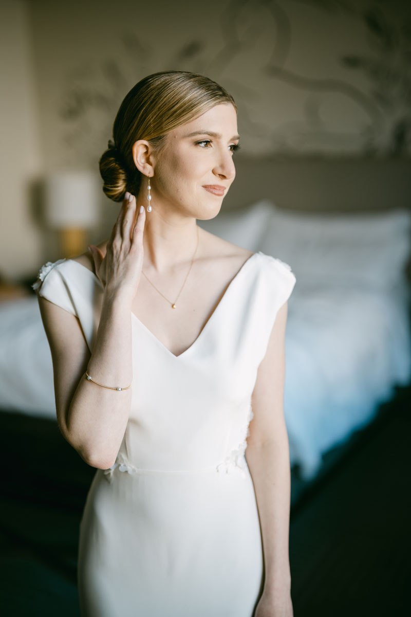 bride getting ready at the Gwen wedding