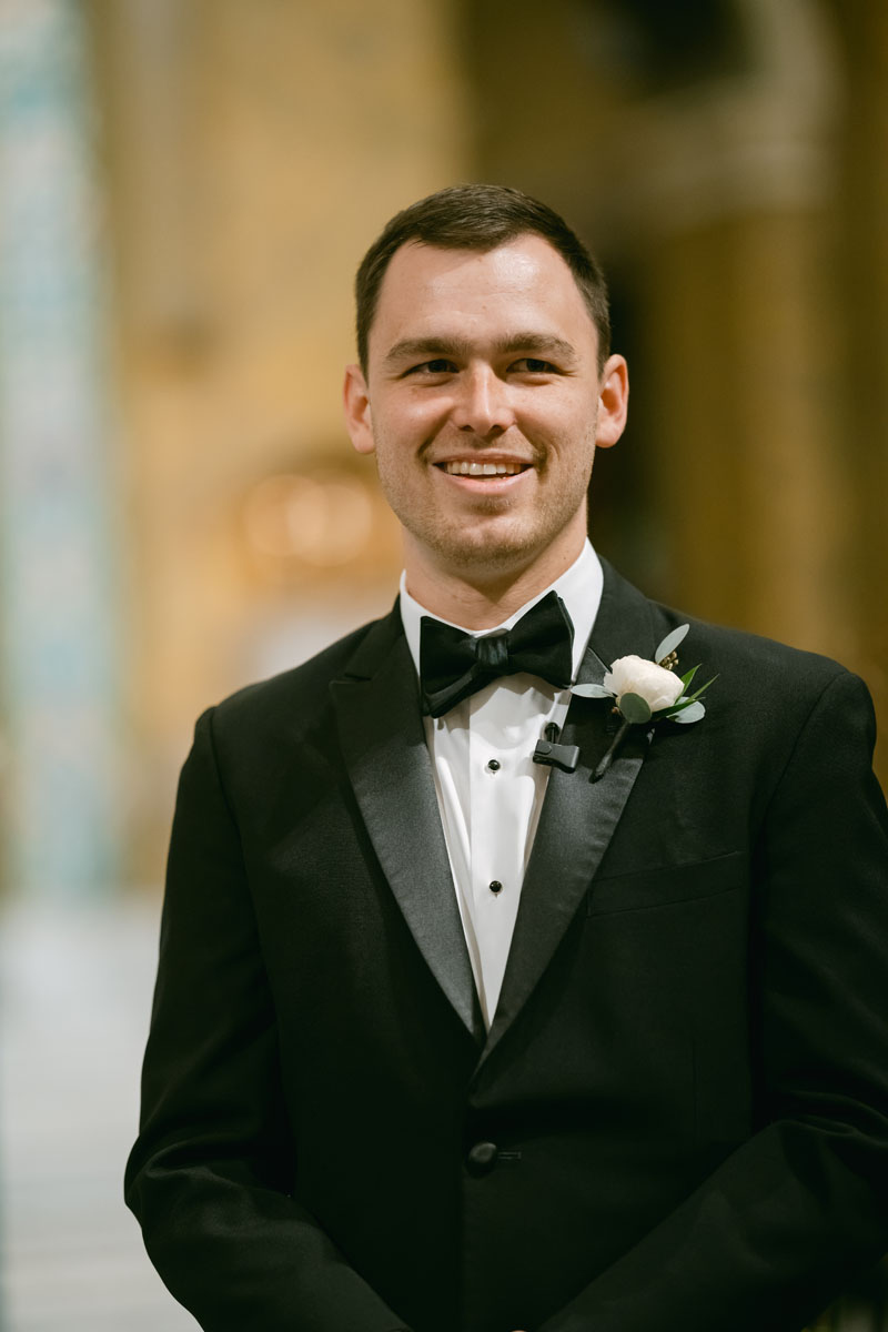 groom seeing bride walking down the aisle