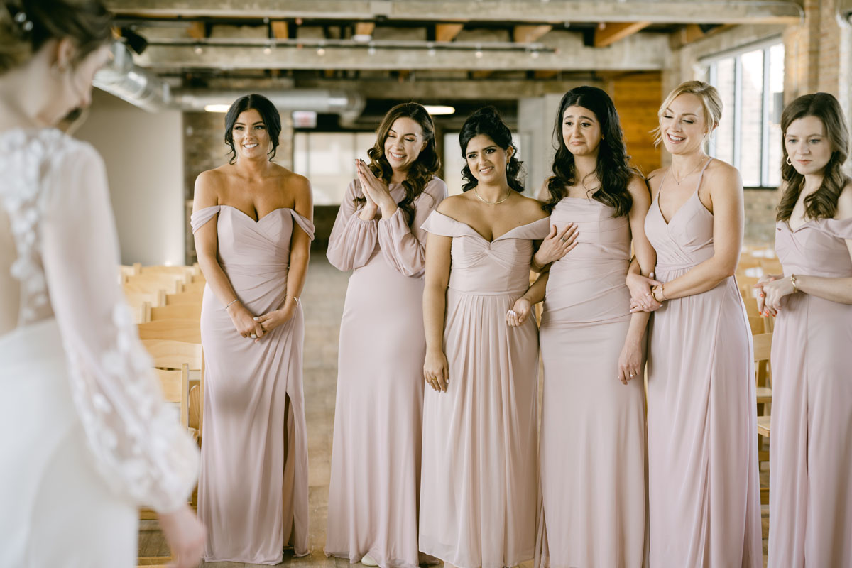 bridesmaids in blush first look with bride at Walden wedding