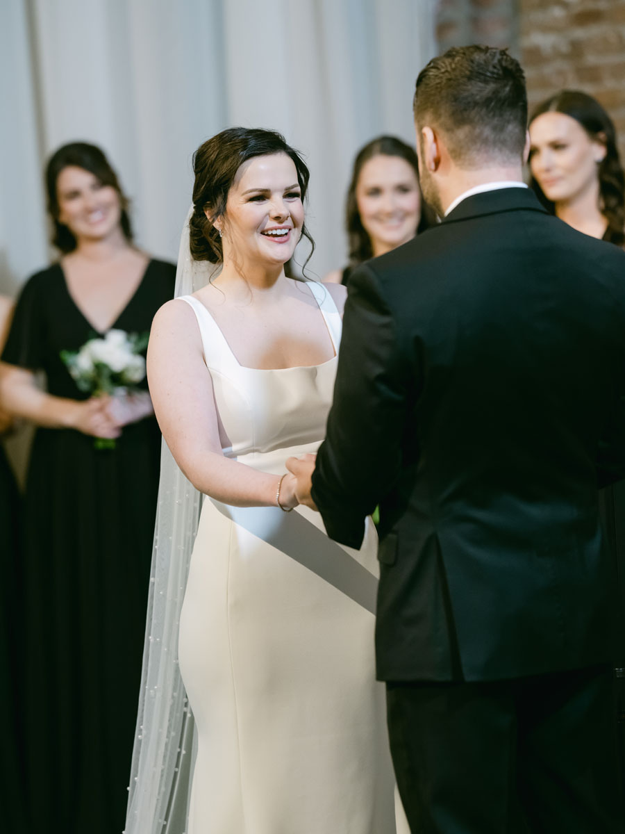 bride looking at groom