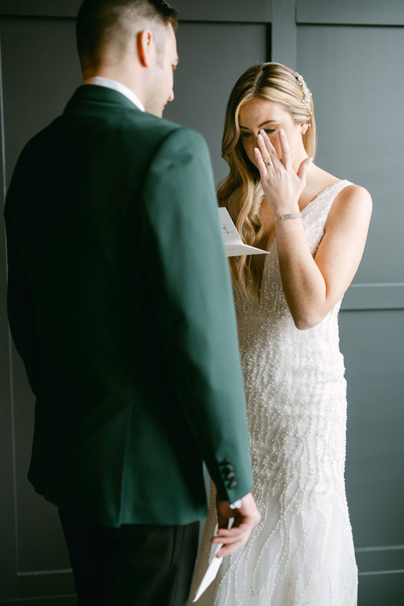 bride reads letter from groom at walden wedding