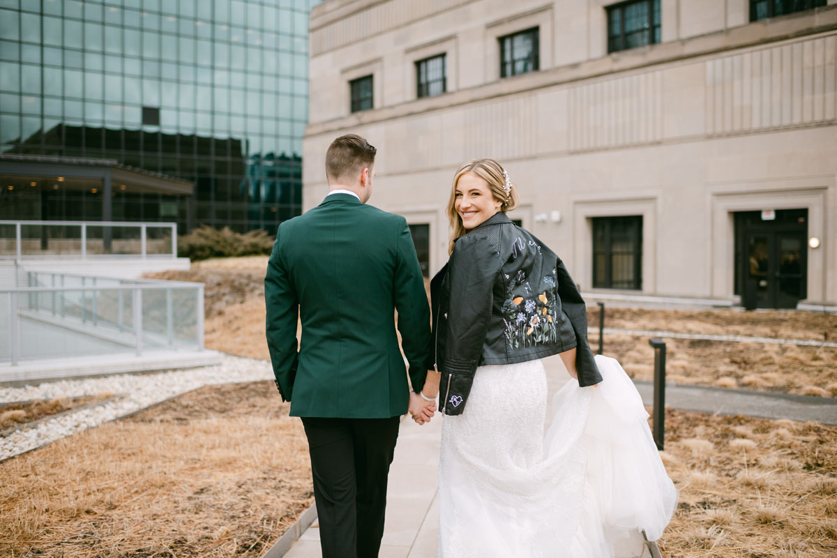 bride leather coat at Old Post Office winter wedding