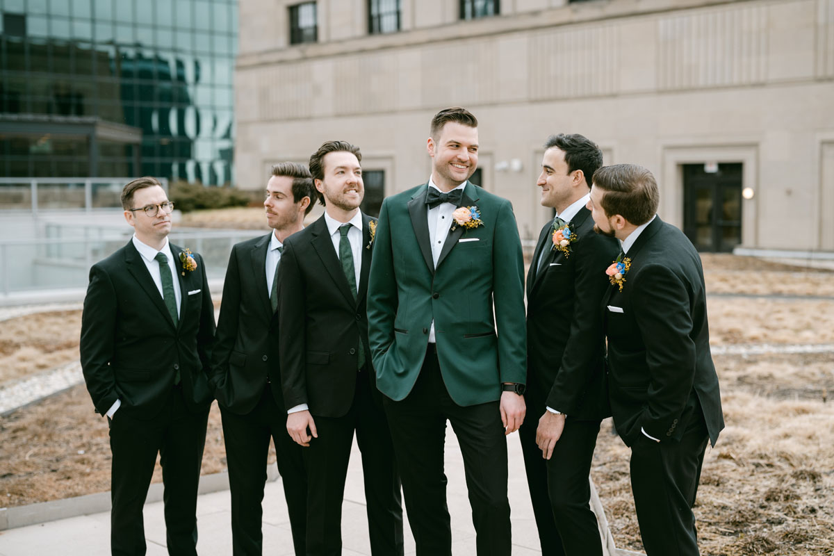 groomsmen in green at old post office wedding