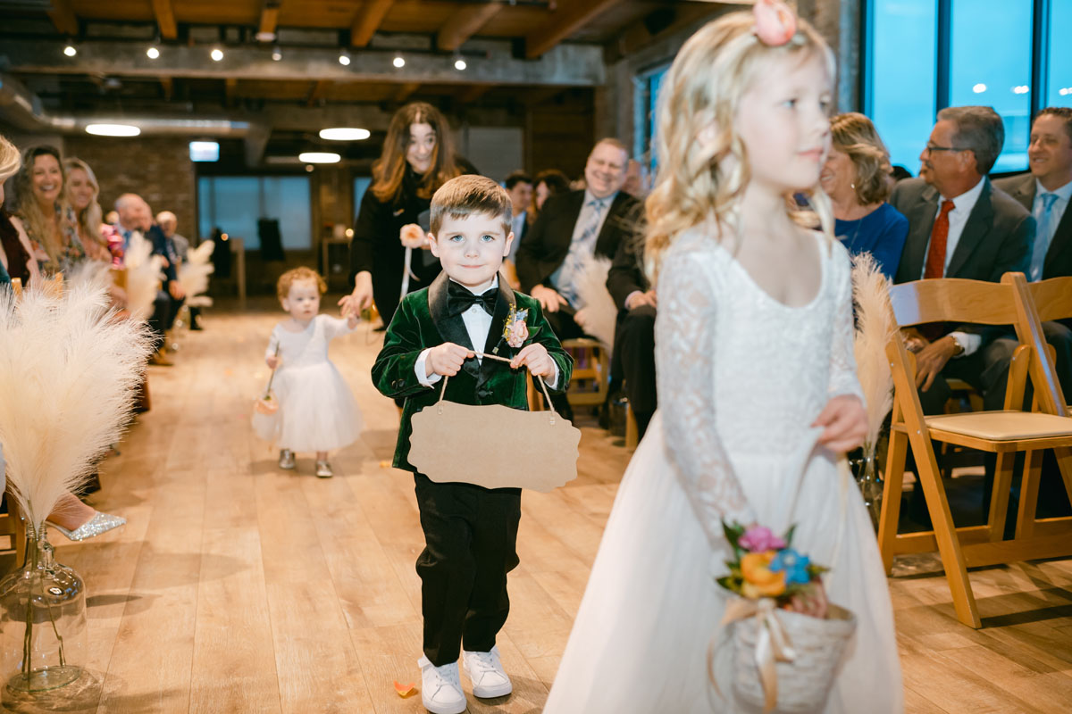 ring bearer walking down the aisle