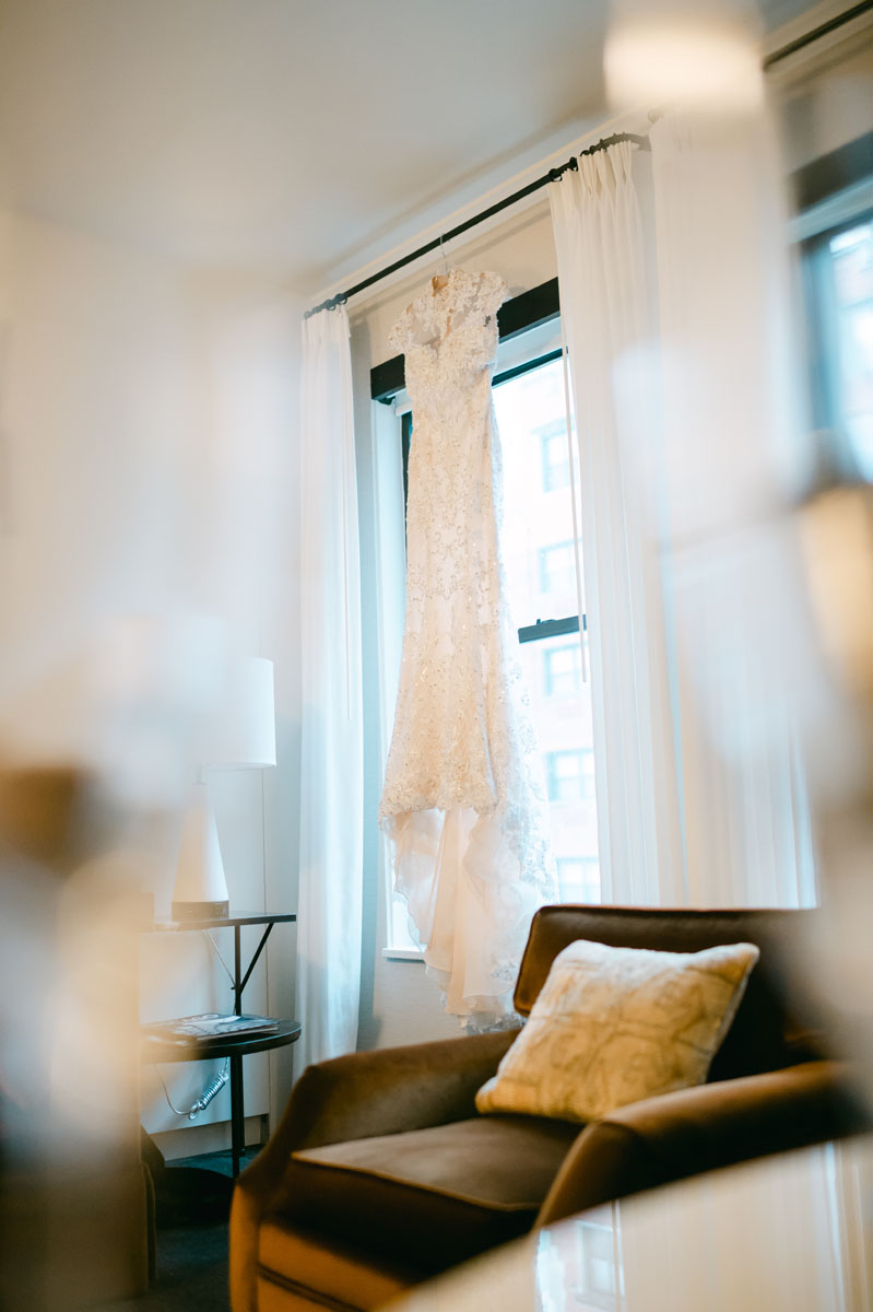 wedding dress hanging at Talbott Hotel wedding