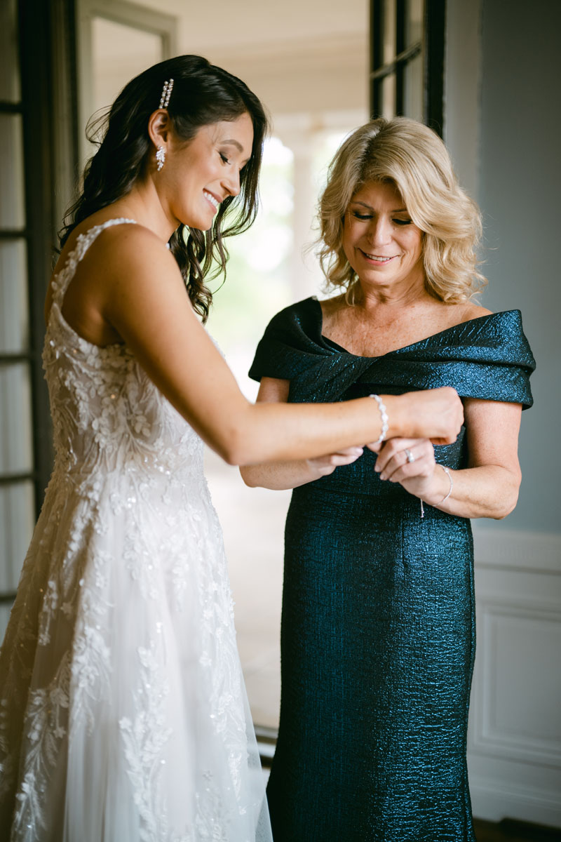 bride with her mom getting ready at armour house