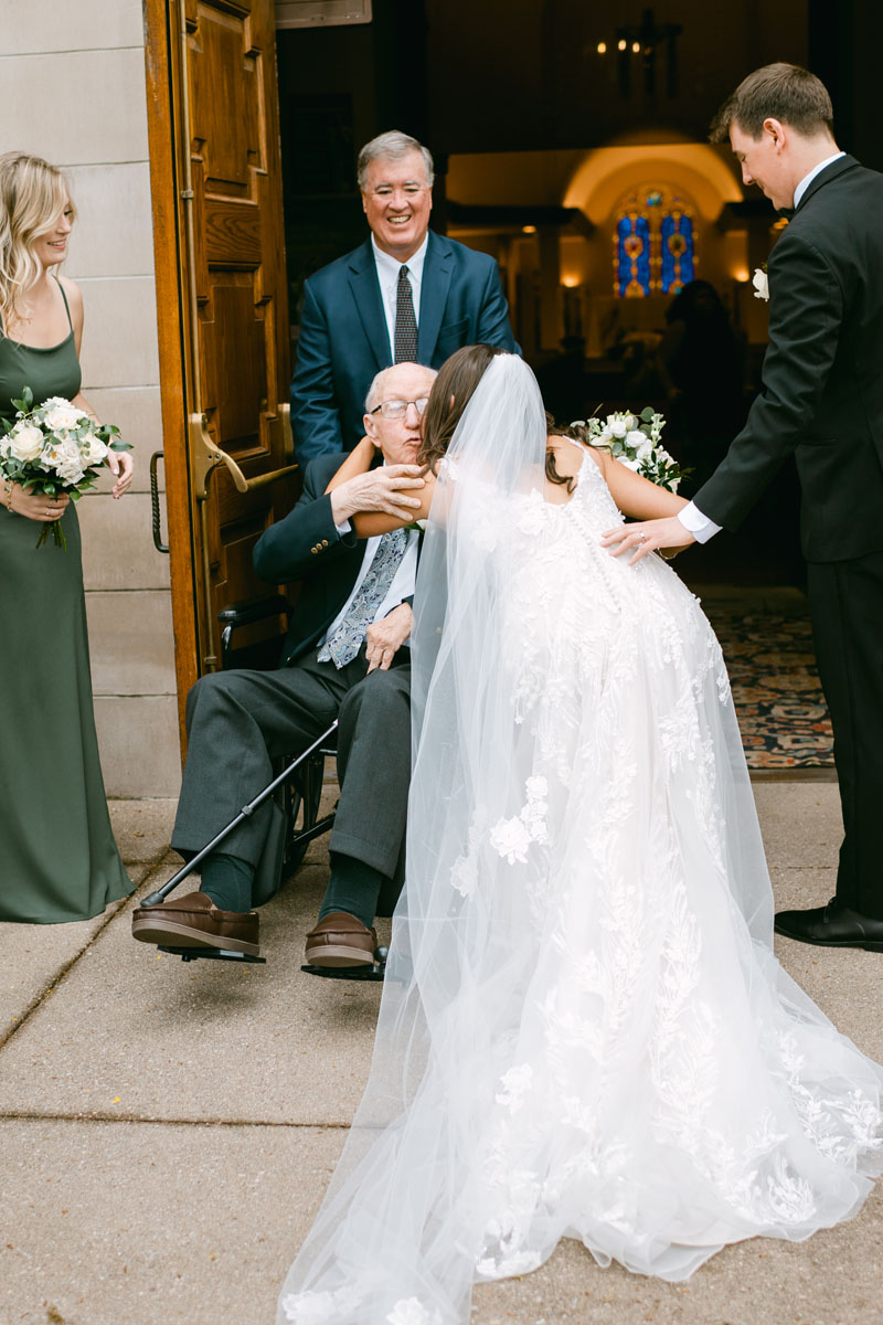 bride hugging grandpa