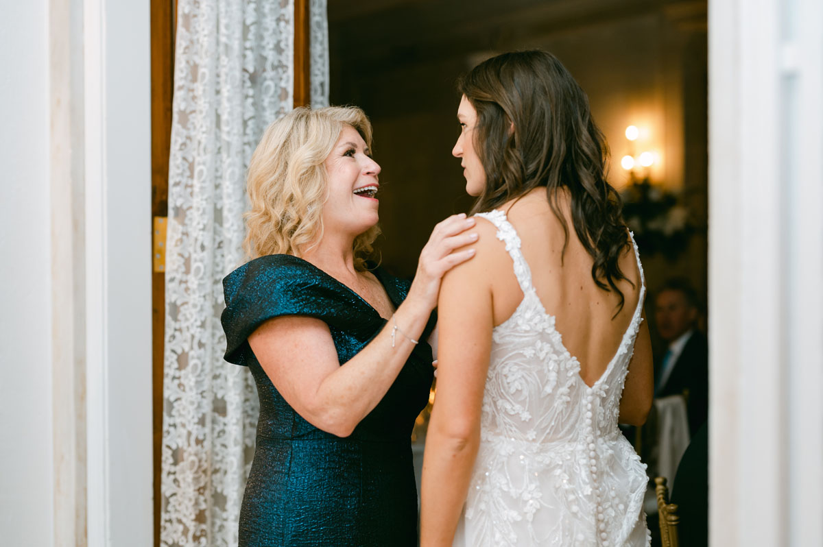 mom and daughter at wedding reception