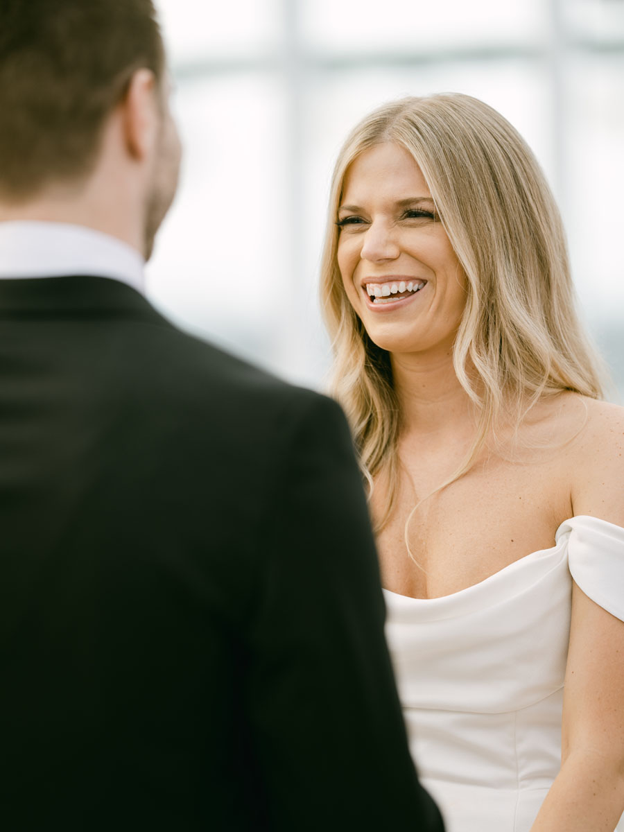 bride smiling at groom
