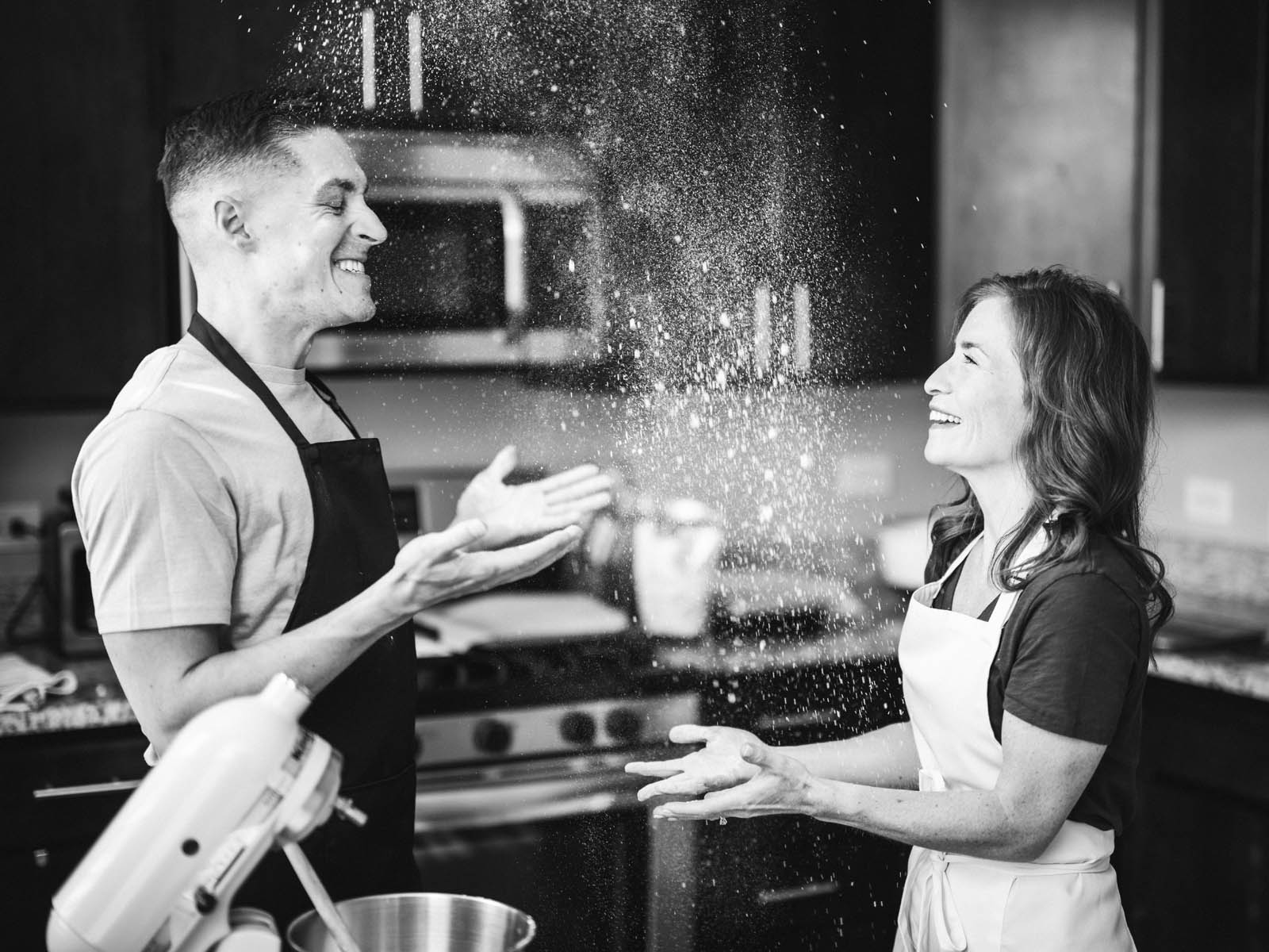 baking cookies engagement shoot black and white photography