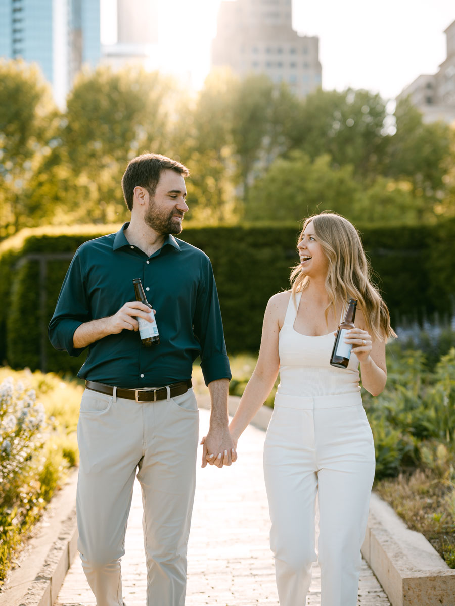 sipping beer on engagement shoot