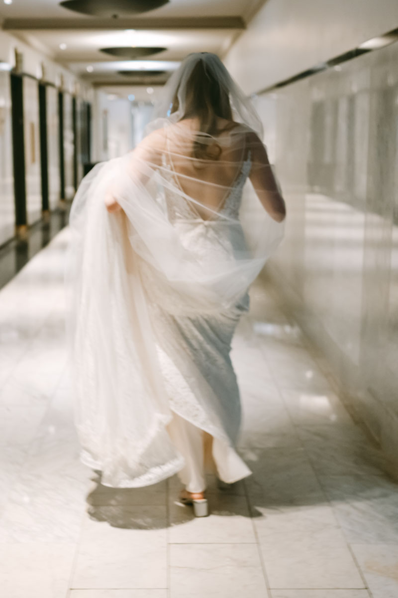 kimpton gray wedding motion blur bride walking