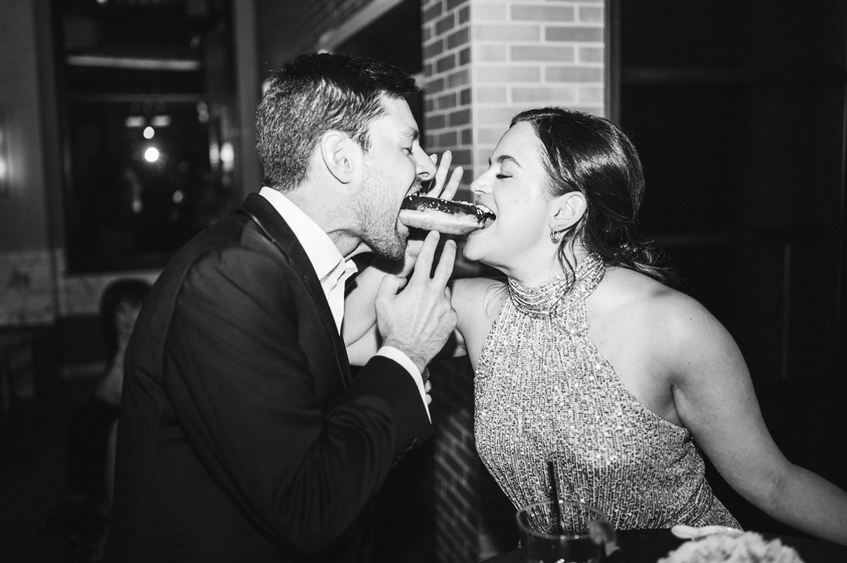 couple sharing a donut