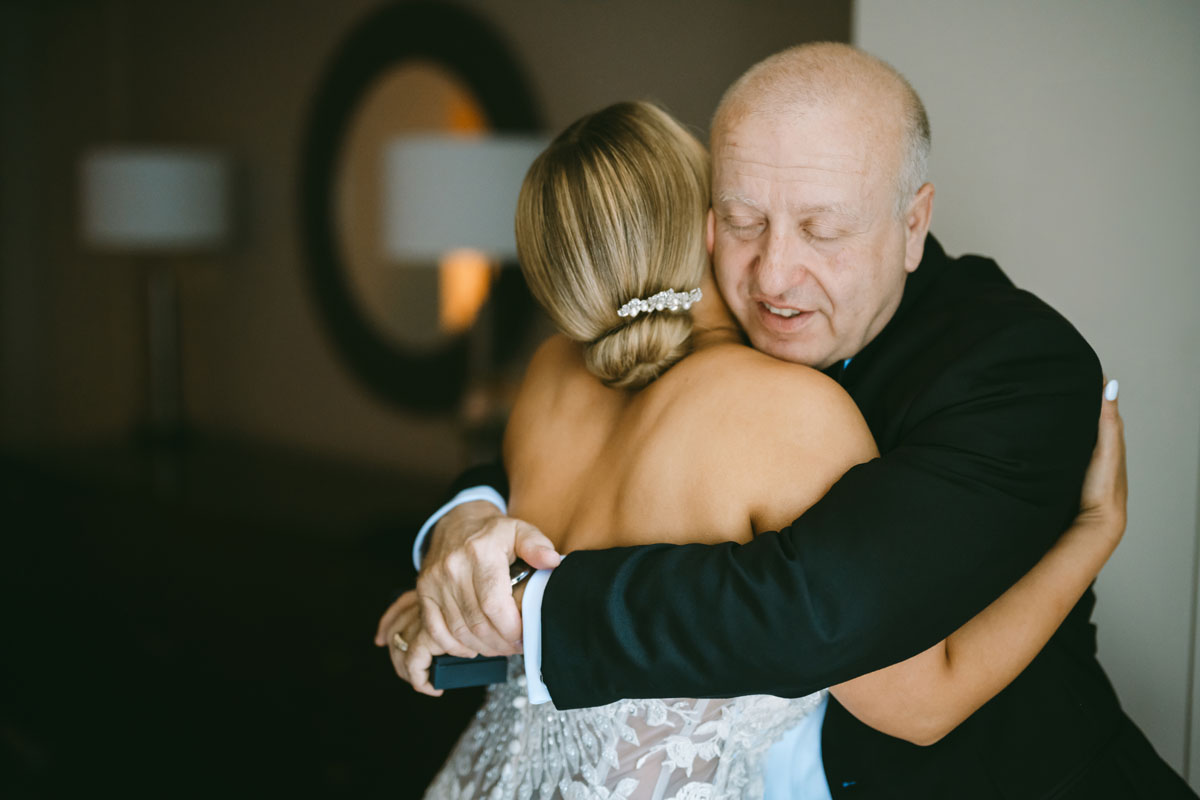 bride hugging her dad