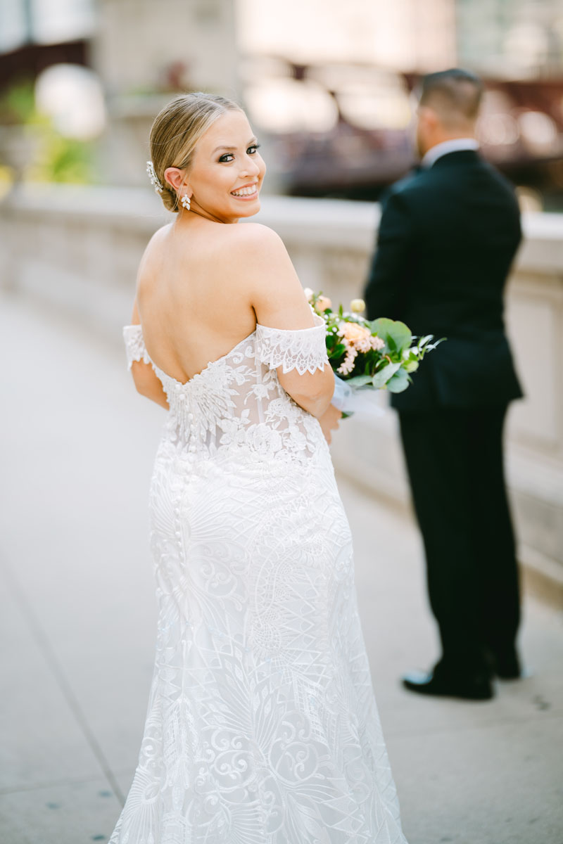light and bright chicago riverwalk wedding photos bride and groom first look
