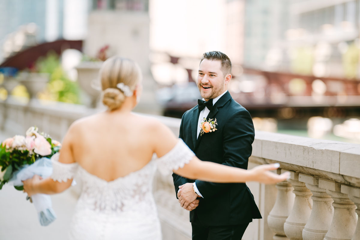 light and bright chicago riverwalk wedding photos bride and groom first look