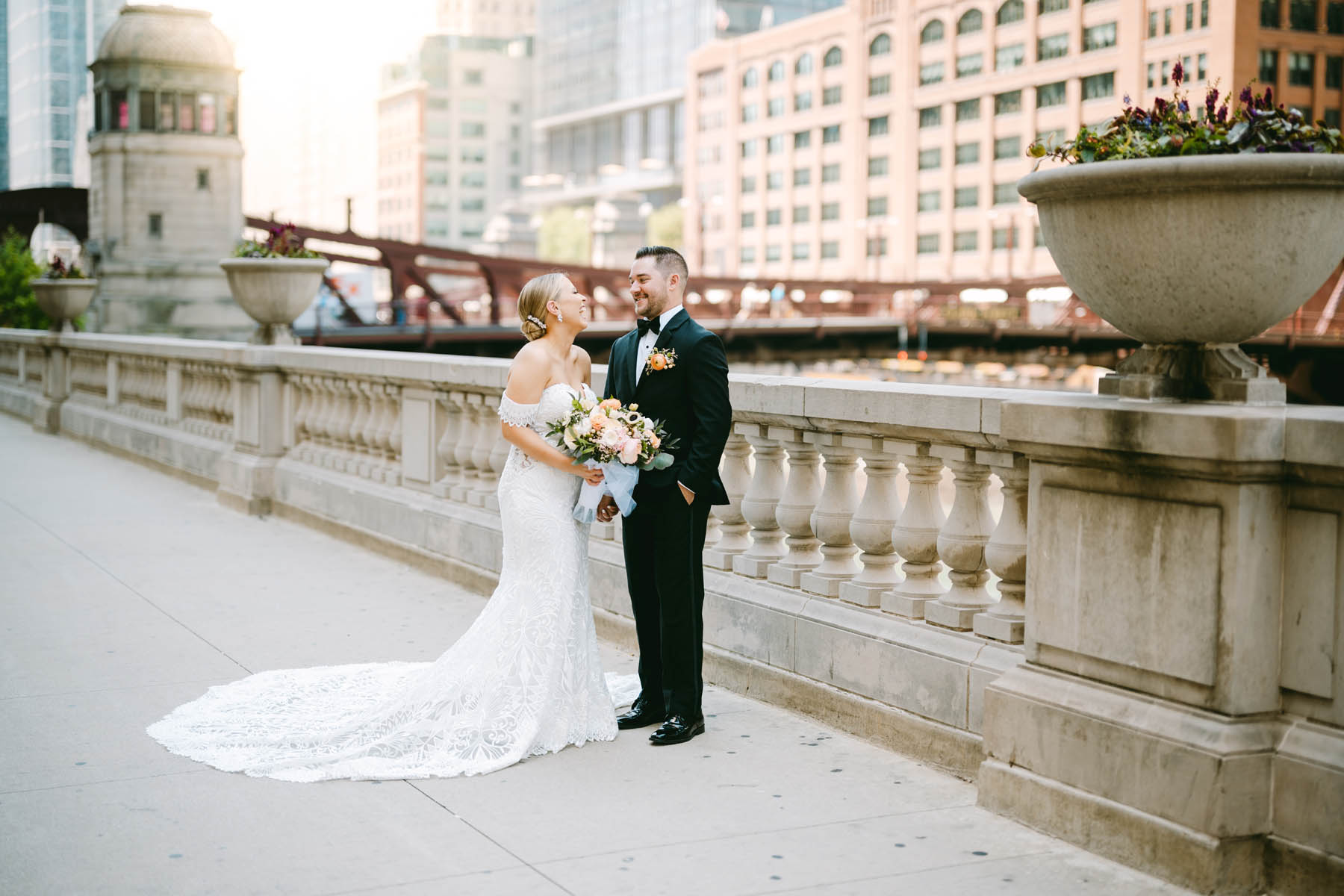 light and bright chicago riverwalk wedding photos bride and groom first look
