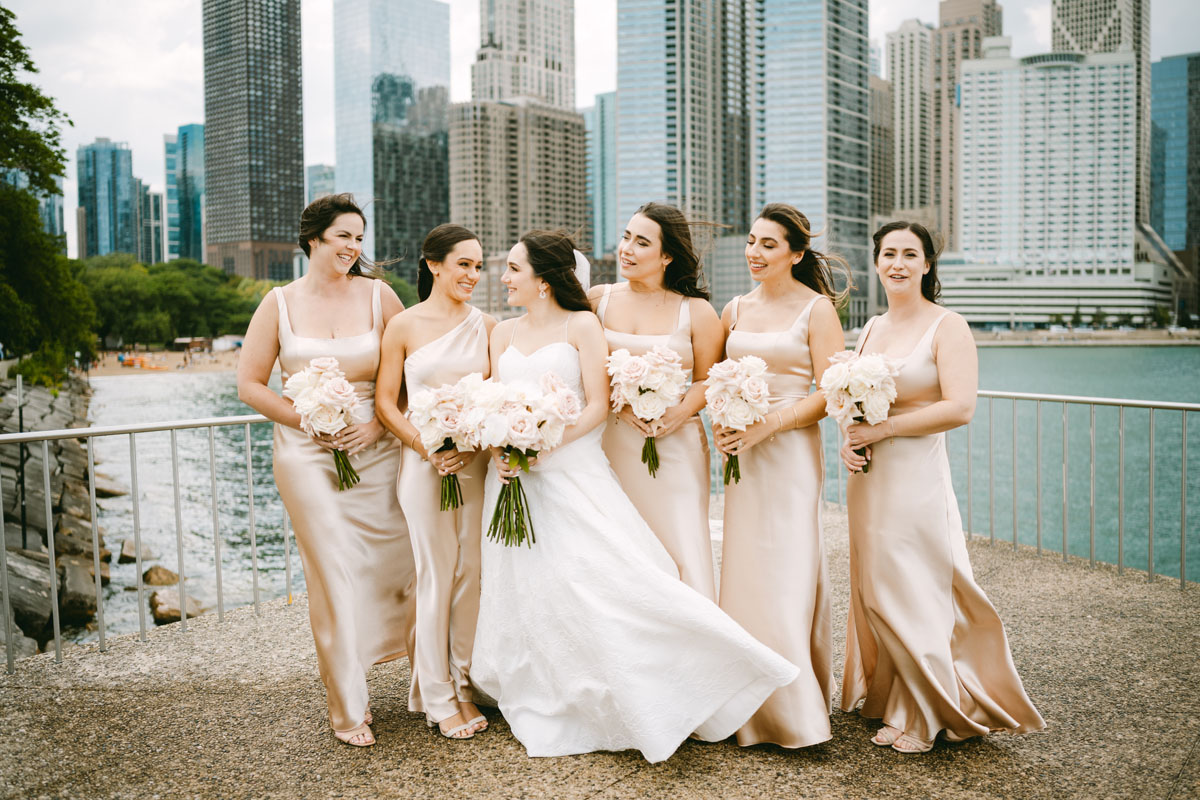 light and bright olive park wedding photo bridesmaid in blush dresses