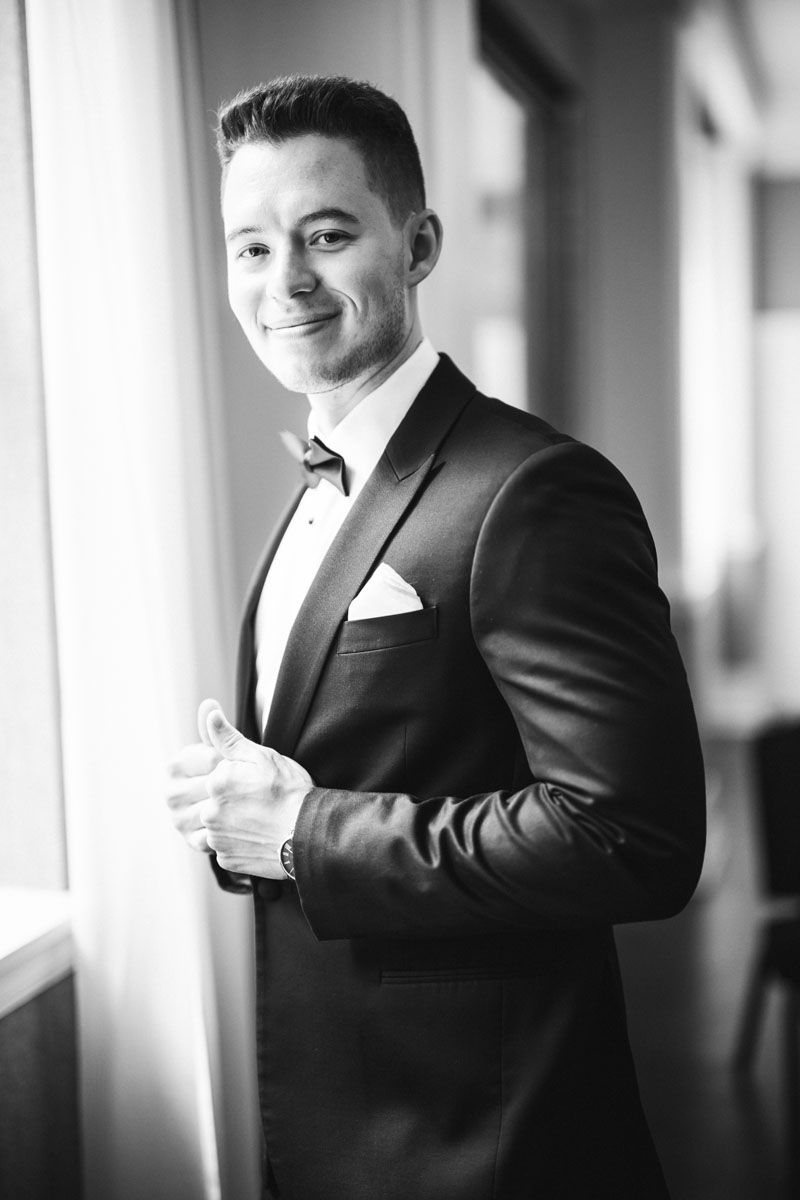 groom getting ready black and white fine art photography