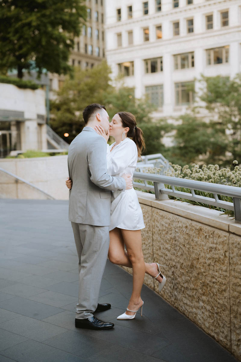 Engagement shoot wearing white dress light and bright