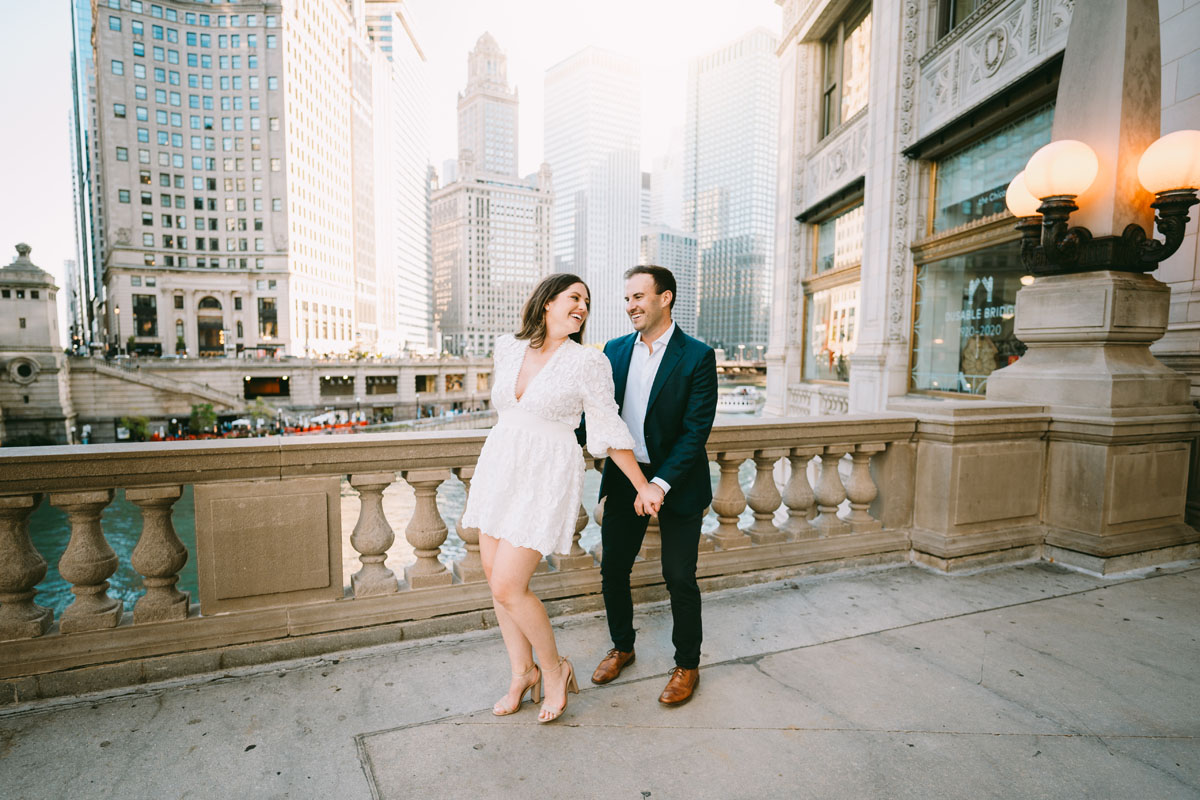 Fall Chicago wrigley building light and bright photographer white engagement dress