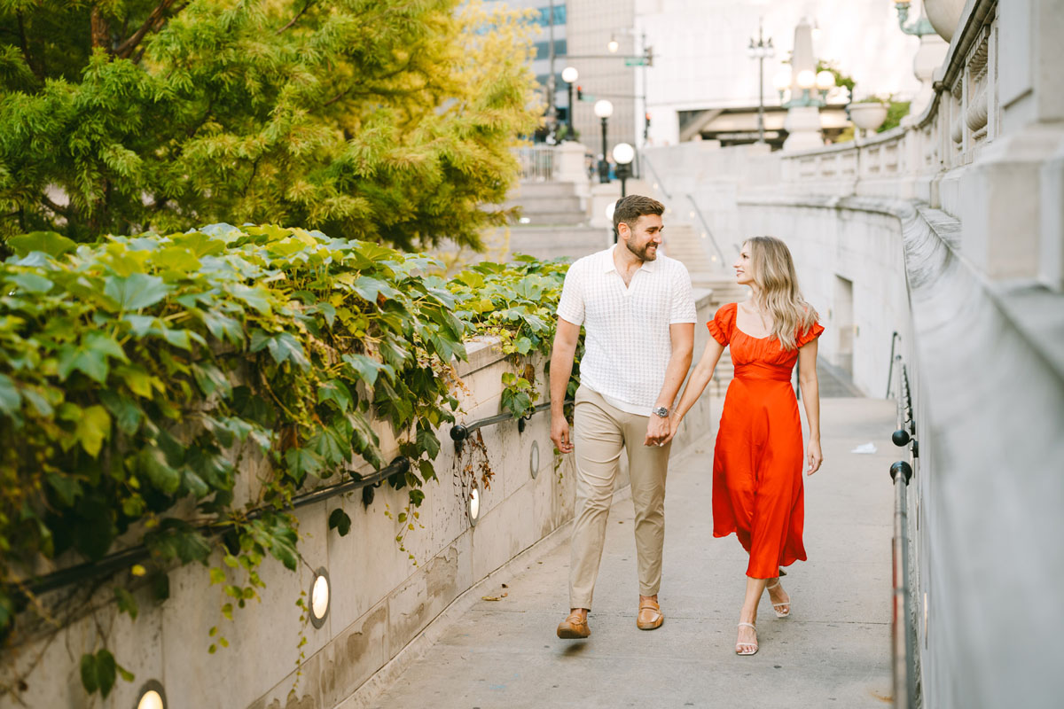 summer chicago riverwalk engagement light and bright photography red engagement dress