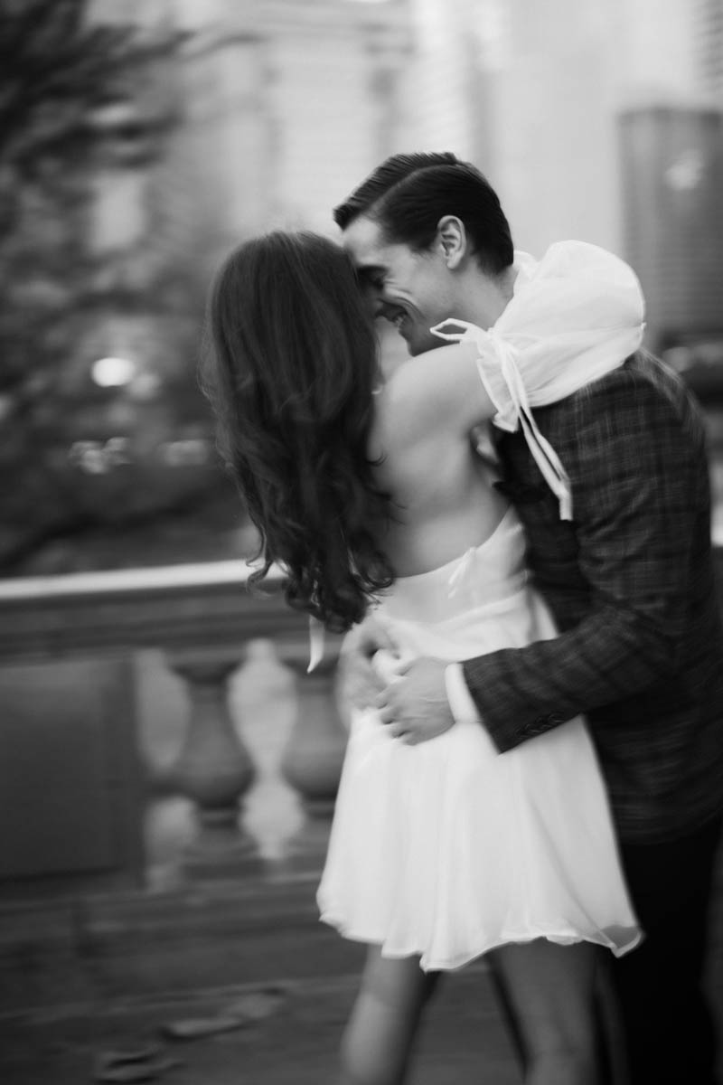 Dark and moody black and white Wrigley Building engagement photography