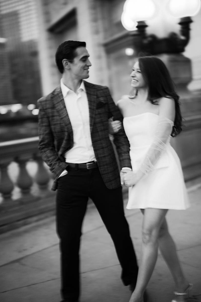 Dark and moody black and white Wrigley Building engagement photography