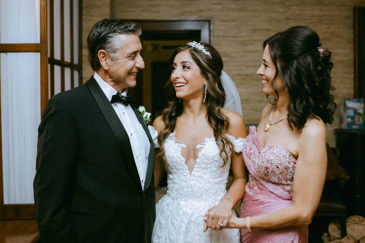 Bride share a sweet moment with her parents