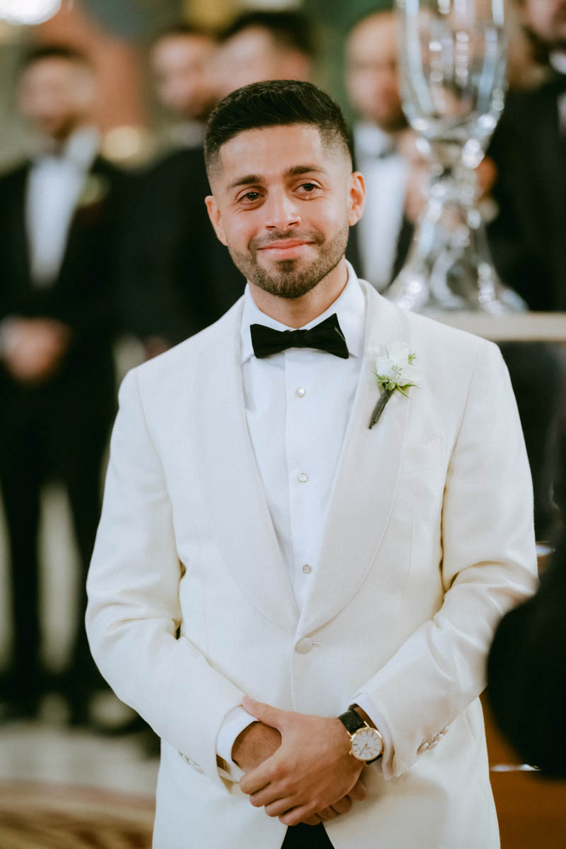 Groom with tears as bride walks down the aisle