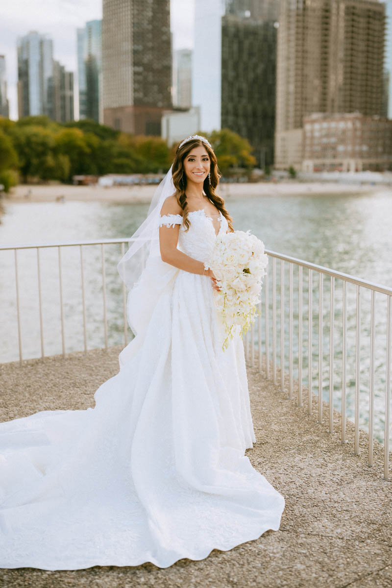Bride posing in her wedding dress at Olive Park