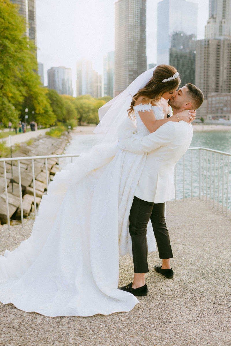 Bride and groom embracing at Olive Park