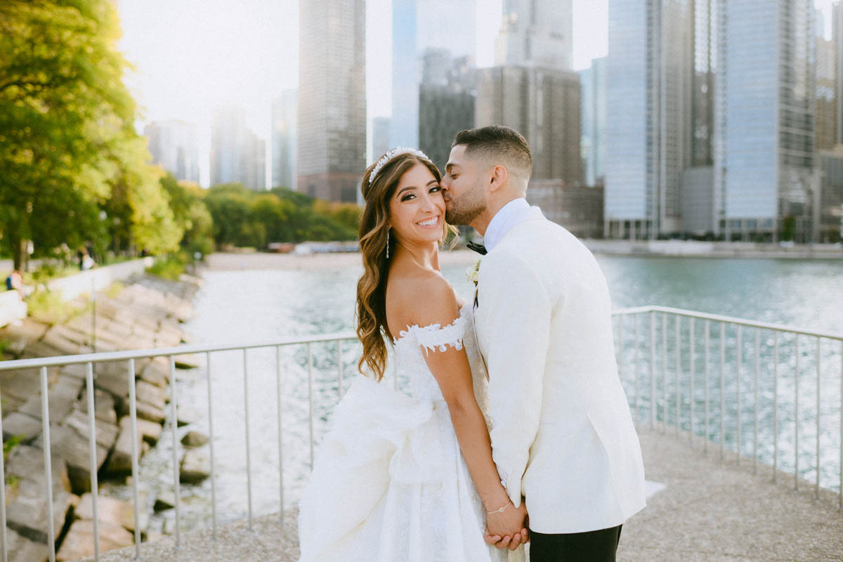 Bride and groom posing at Olive Park