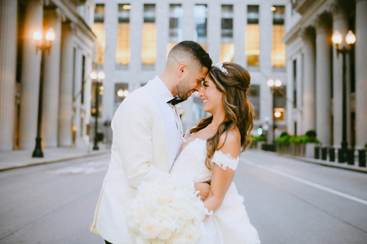 Bride and groom sharing a quiet moment at the Chicago Board of Trade