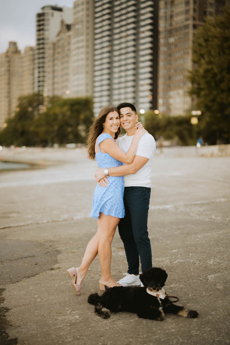 Chicago engagement photo of a couple embracing near Lake Michigan