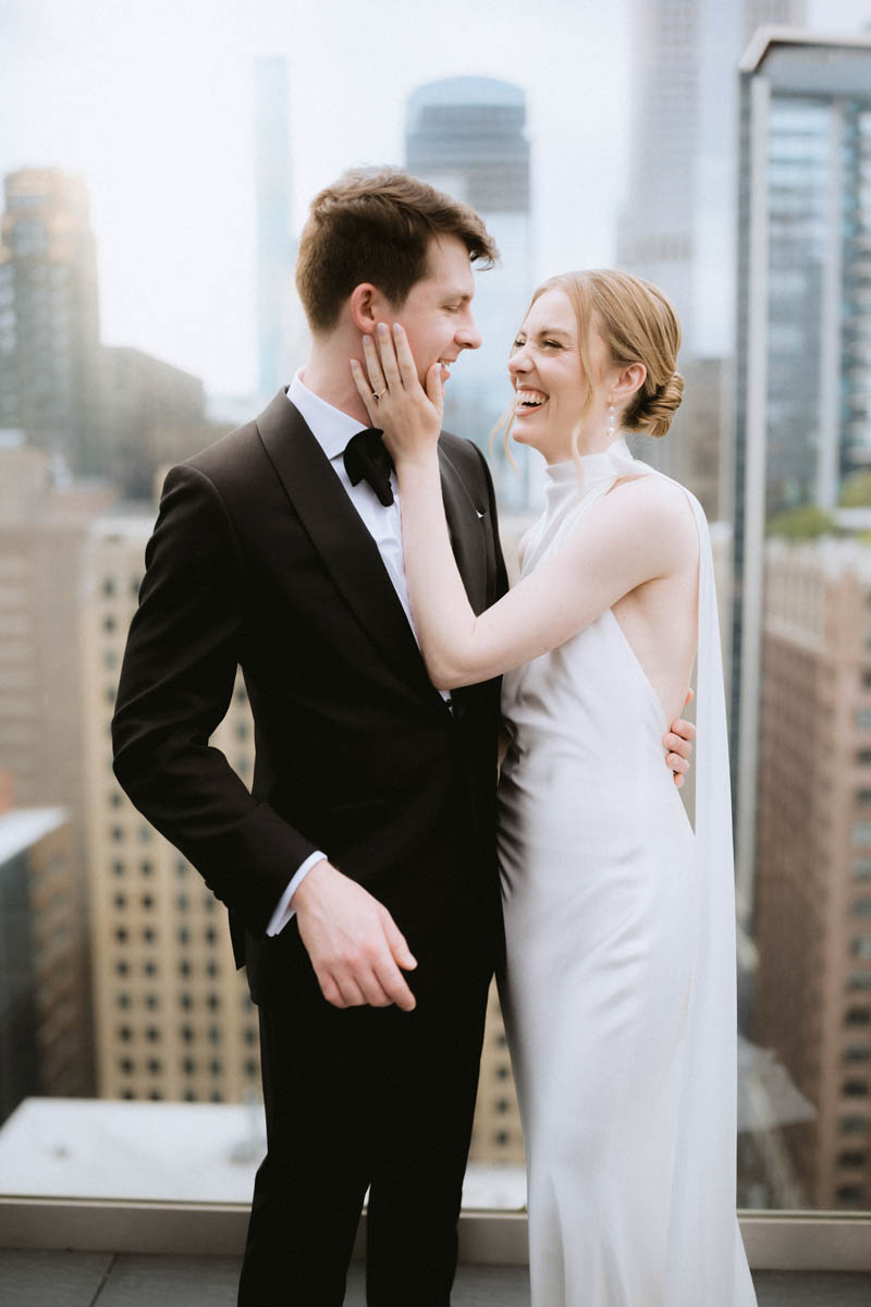 Bride and groom on the balcony of the Wit wedding