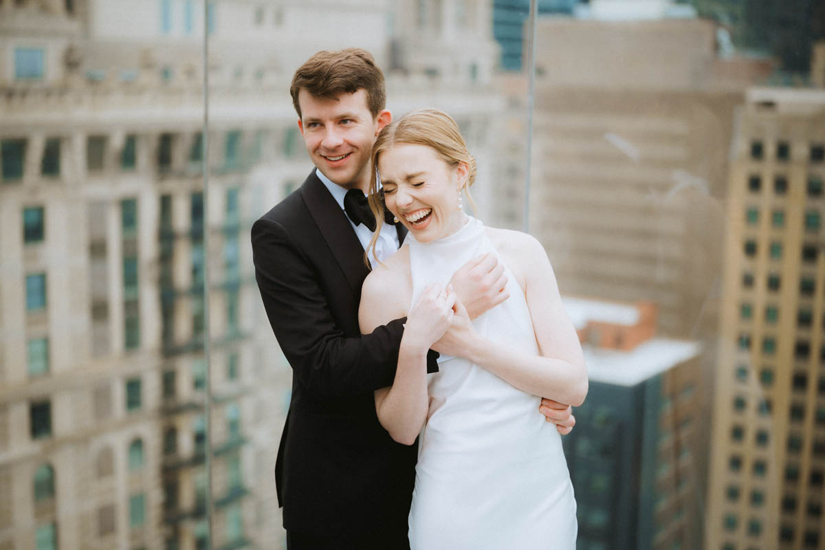 Bride and groom on the balcony of the Wit wedding