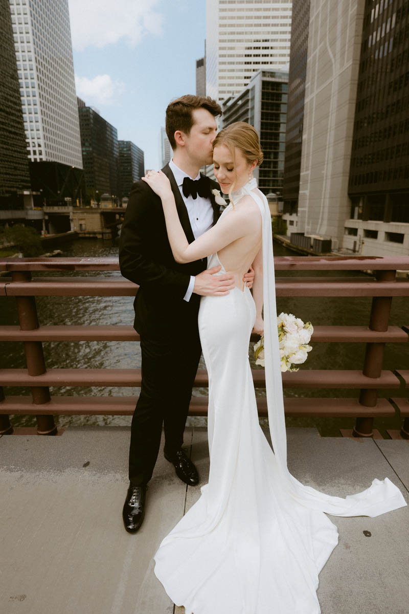 Bride and groom portrait on bridge on the Chicago riverwalk