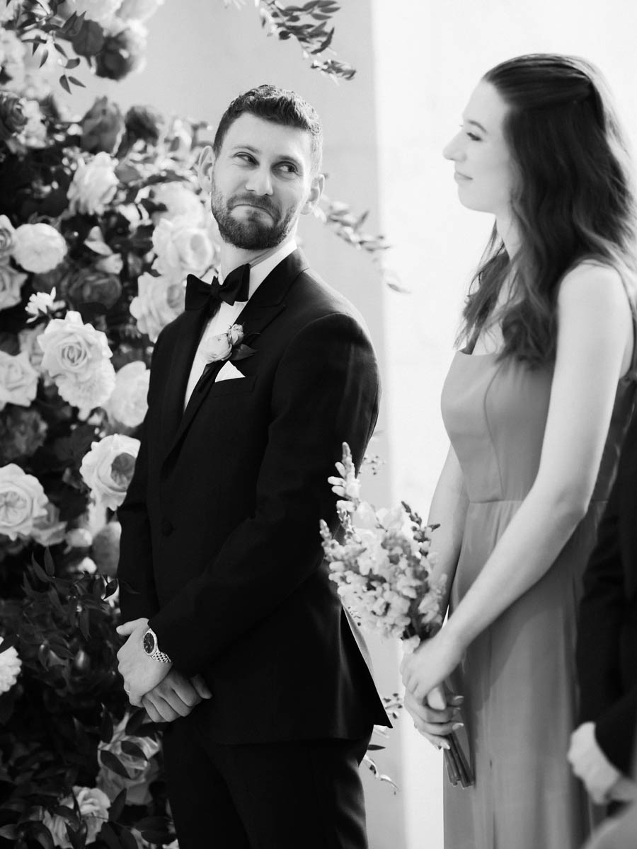 Best man tearing up during wedding ceremony