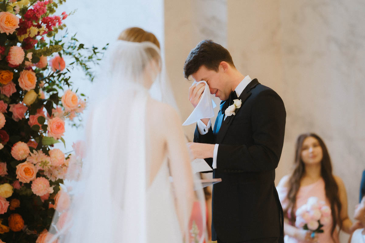 Groom wiping tears at Old Post Office Wedding